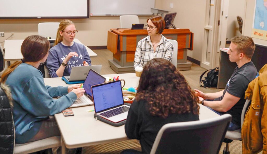 Assistant director, Lea, with a group of students