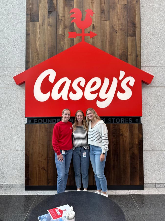 Regan Saxton (center) at Casey's-internship