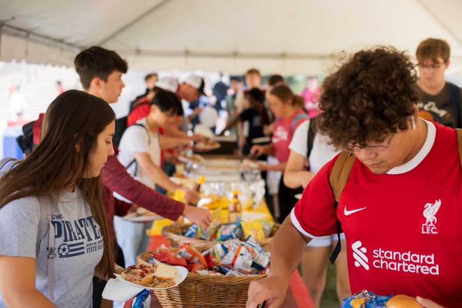 Students serve themselves in a lunch buffet line at the Ivy College of Business.